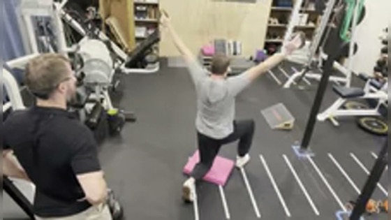 Andrew Williams coaching his client Adrian through a lift at Strength & Positions
